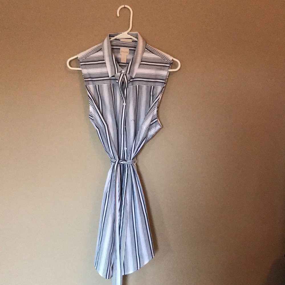 Chico’s Navy and white striped sleeveless shirt.